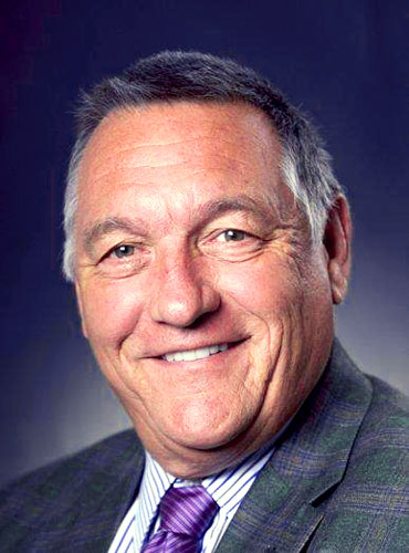 A photo of an older man.