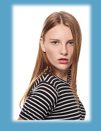 A photo of a white model posing.